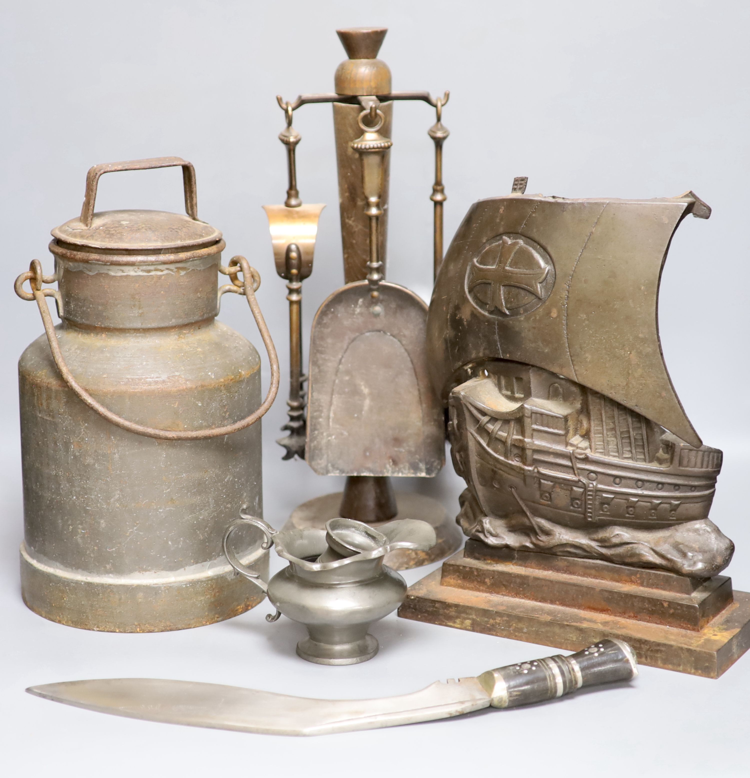 Fireside metalware, a kukri, a churn and assorted Unigate milk bottles